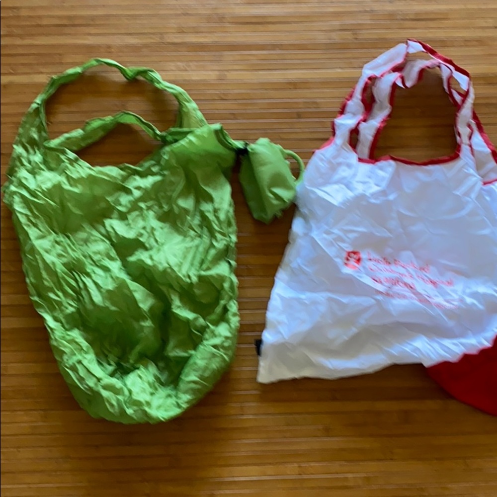 2 never used fold up shopping bags with holder